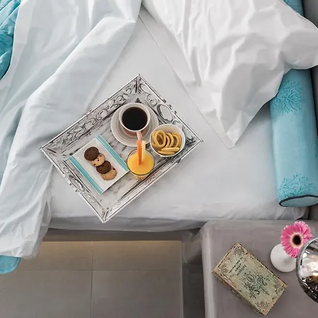 فندق إليمنتس أوف كالديرا سويتس